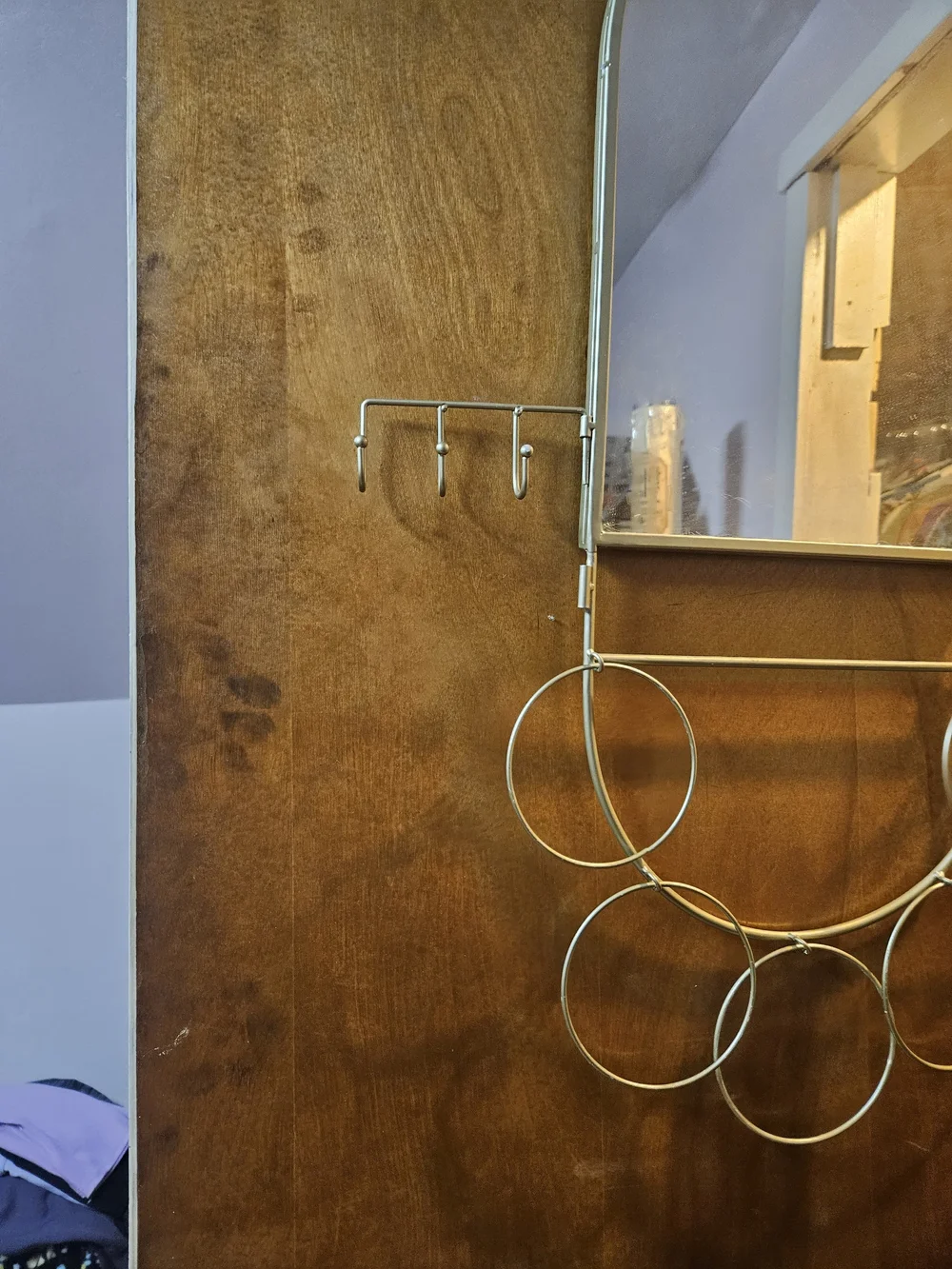 Gold Metal Wall Mirror with Jewelry Rings and Hooks